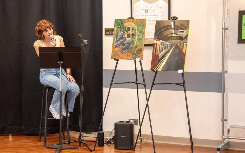 Photo courtesy Elisha Boggs. Olivia Bonner of Clarkesville sings jazzy tunes through the evening. The music gave the entire evening an artsy vibe.
