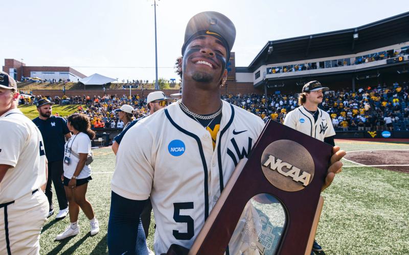 Photos courtesy WVU Athletics. Armani Guzman, a Rabun Gap graduate, and the West Virginia Mountaineers earned their first trip to Omaha with a 45-15 overall record and No. 16 national seed.