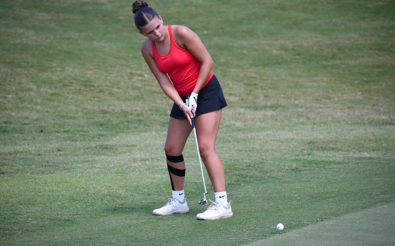 Wesley Branch/The Clayton Tribune. Rabun County freshman Jayden Griggs putts during the Class A Division I state championship on May 18 at Arrowhead Pointe Golf Course in Elberton. Griggs, Queen and Hulsey comprised the girls golf team, marking the first time in several years the Lady Cats had a full team.