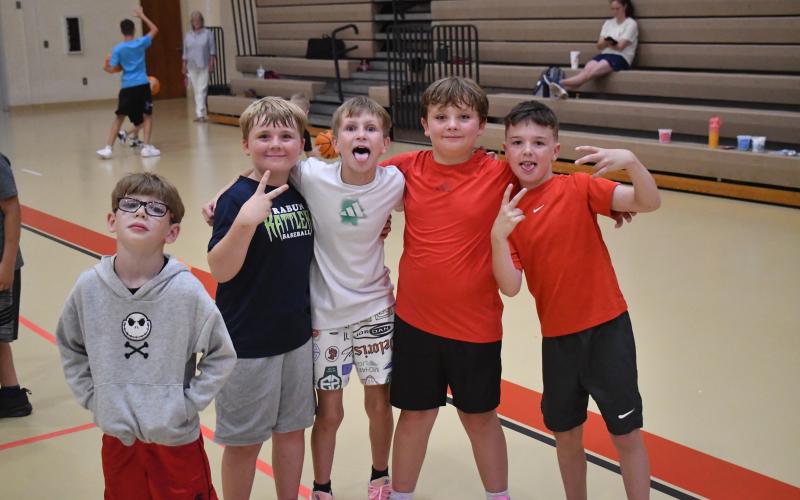 Wesley Branch/The Clayton Tribune. Campers pose for a photo at the RCHS basketball camp at the Rabun County Rec Department on June 2.