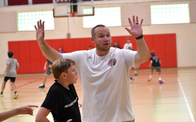 Wesley Branch/The Clayton Tribune. Rabun County assistant coach Corey Page works with campers during the Rabun County basketball camp at the Rabun County Recreation Department on June 2. Page was in his first year as the Wildcats’ assistant coach this past season.