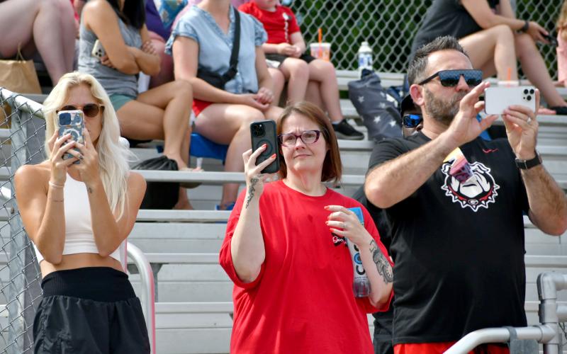 Enoch Autry/The Clayton Tribune. Lots of parents and family members brought out their phones to video the Gunner Stockton Youth Football Camp