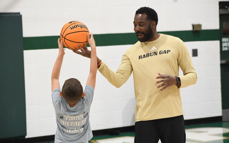 Wesley Branch/The Clayton Tribune. Campers learned the fundamentals of basketball and played games during the five-day camp.