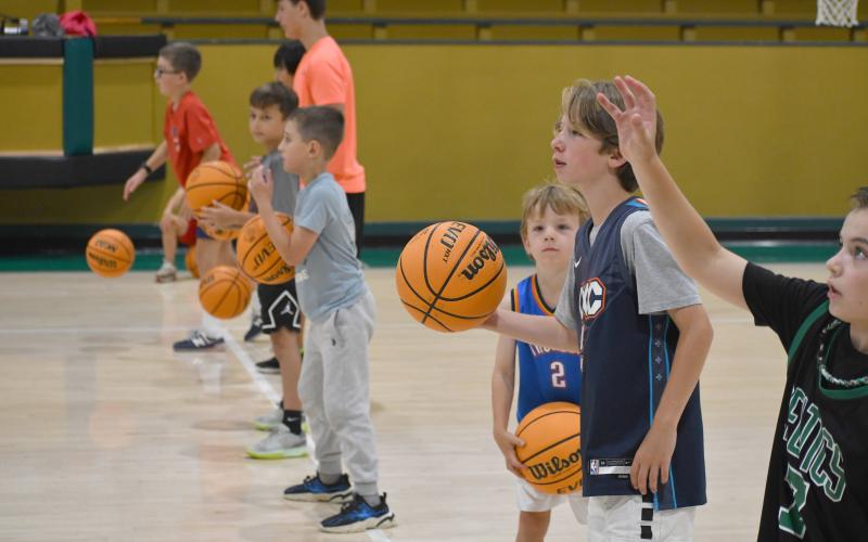 Wesley Branch/The Clayton Tribune. Campers work through ball-handling drills during Rabun Gap’s kids basketball camp on June 8 on Rabun Gap-Nacoochee School’s campus. Campers ages second through seventh grade worked on ball handling and other parts of the game during the five-day camp.