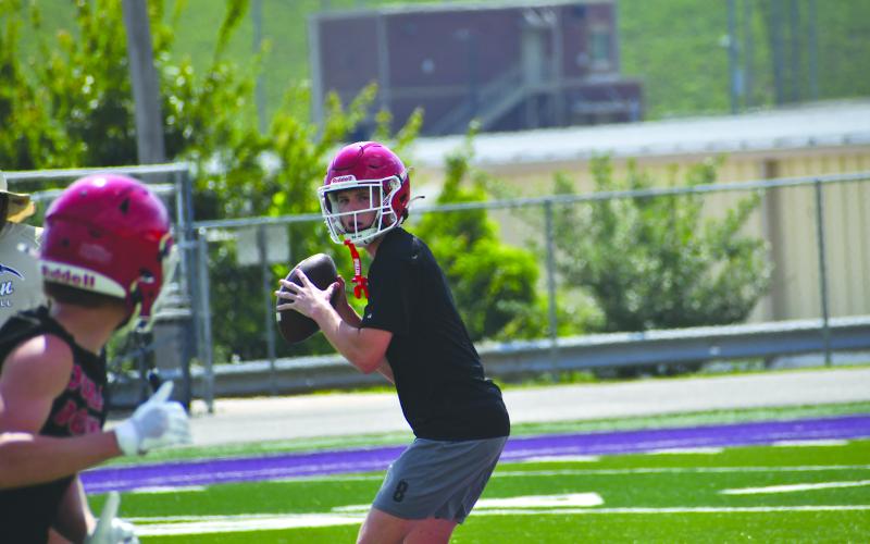 Wesley Branch/The Clayton Tribune. Rabun County rising junior Colter Cannon looks downfield for an open receiver during Rabun County’s 7-on–7 versus Lumpkin County and Union County on June 11 at Union County High School. Cannon filled in at QB for the day for rising sophomore Cooper Kowalsky.