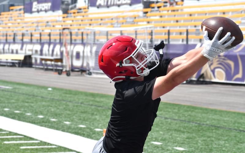 Wesley Branch/The Clayton Tribune. Rabun County rising senior Reed Burrell hauls in an uncontested touchdown pass from Colter Cannon during Rabun County’s 7-on–7 versus Lumpkin County and Union County on June 11 at Union County High School. Burrell is expected to be the Wildcats’ top receiving threat this upcoming season.