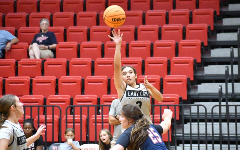 Wesley Branch/The Clayton Tribune. Rabun County rising senior Addy Beth Owens goes up for a floater in Rabun County’s 55-50 summer scrimmage win over Lamar County on June 15. Owens is heading into her senior season as a Lady Cat.