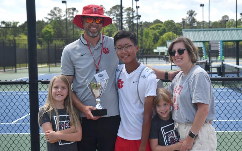 Wesley Branch/The Clayton Tribune. Rabun County head boys and girls tennis coach Bryan Getty poses with family members with the Boys Class A Division I runner-up trophy after Rabun County’s state championship match with Brantley County on May 13 in Rome. Getty was added to Blitz Sports’ “Legendary Coaches List” on Monday and is just the third tennis coach on the list.