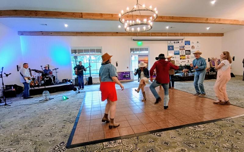 Megan Horn/The Clayton Tribune. Many people dance as the Steve Bryson Band performs country music during the June 20 Forward Rabun/Rabun County Chamber of Commerce “2026 Awards Hoedown.”