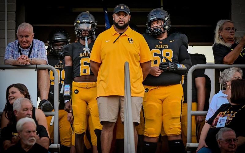 Submitted photo. Newly hired RGNS assistant football coach Quinnon Isom eyes the field before leading Union County (S.C.) onto the field for kickoff. Isom was recently hired as Rabun Gap’s defensive backs coach and defensive pass game coordinator, replacing Dale Earnhardt.