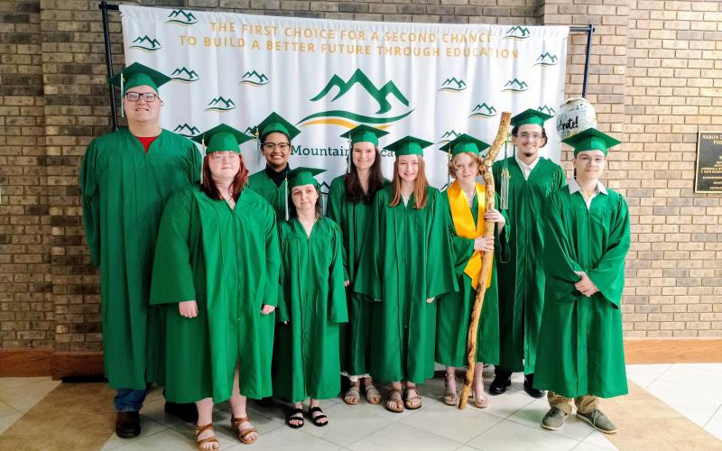 Megan Horn/The Clayton Tribune. Rabun Mountain Education Class of 2026 graduates are front from left: Nova Sayra Star Harkins, Charlotte Holcomb, Anna Beth Richardson, Adaira Joelee Day and Oscar Korigan Valdes. Back row from left: Cooper Lathan Powell, Emerald Vaylin Pittman, Ora Bella Davis and Ryan Douglas Wayne Eker. Not pictured are James Oliver McDade, Paxton Lee Mooney and James Cannon Ramey.