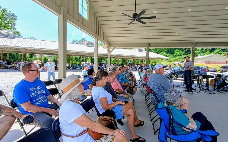 Megan Horn/The Clayton Tribune. Evangelist Steve Foster speaks to a crowd about the importance of engaging in conversations about the Gospel of Jesus Christ during the June 13 Community Celebration event sponsored by the Rabun County Association of Southern Baptist Churches.