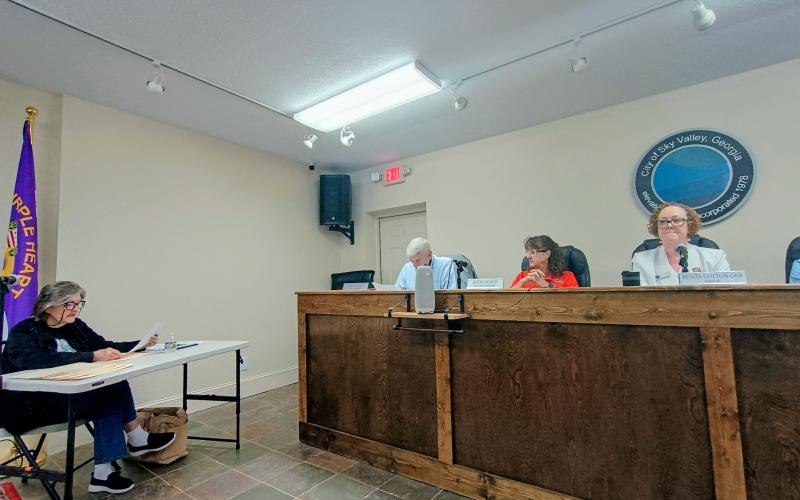 Megan Horn/The Clayton Tribune.  Sky Valley citizen Jerri Smith addresses council members during a May 26 city council Board of Zoning Appeals Hearing. Smith filed an appeal for an administrative interpretation with the city’s Board of Zoning Appeals following a March 5 decision by the council to adopt an amendment to the Sky Valley Zoning Ordinance that adds language allowing full-time and part-time residents to be appointed to serve on the Sky Valley Planning and Zoning Commission.