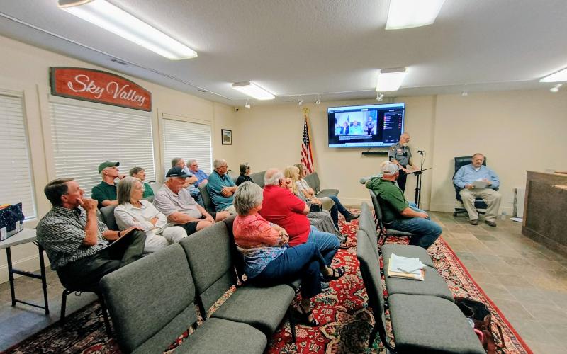 Megan Horn/The Clayton Tribune. Many community members attended the evening meeting of the Sky Valley City Council on Tuesday, June 16. Citizens listen as Police Chief Ron Baumes gives his department report and discusses the benefits of having Flock Safety cameras in city limits.