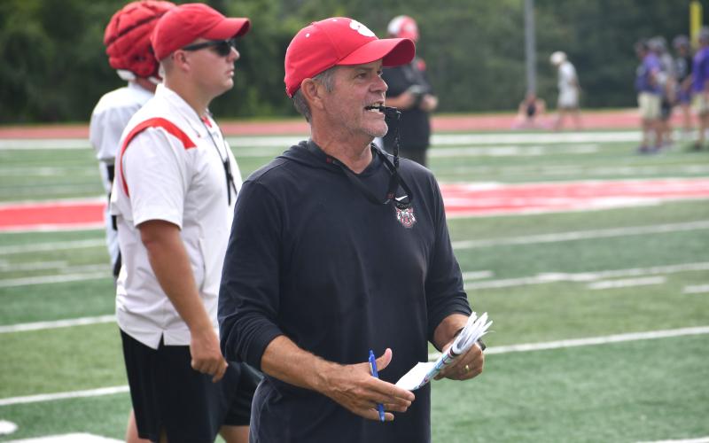 Wesley Branch/The Clayton Tribune. Rabun County head football coach Rance Gillespie watches his team during the July 14 padded camp session. Gillespie is heading into year two as the head football coach at RCHS, following a 10-3 season and state quarterfinal appearance.
