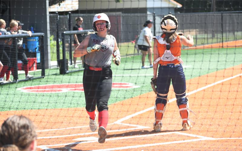 Wesley Branch/The Clayton Tribune. Rising Lady Cat senior Kenlee Hedge crosses home plate for a run during Rabun County’s July 20 scrimmage with Habersham Central. RCHS faced the Class 6A Raiders and Class 3A Stephens County Indians in their most recent scrimmages to prepare for the upcoming season.