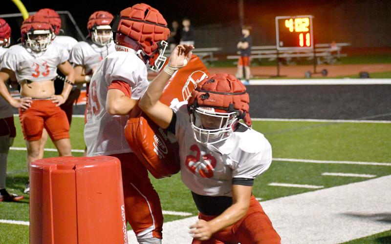 Wesley Branch/The Clayton Tribune. Rabun County junior Layne Holcombe goes through drills during Rabun County’s “Midnight Madness” practice on July 27. The Wildcats open the regular season on Aug. 28 at home versus Metter, which is coached by former RCHS head coach Lee Shaw.