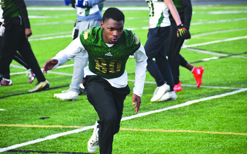 Wesley Branch/The Clayton Tribune. Rabun Gap junior defensive back Elias Willingham goes through drills during Rabun Gap’s college coaches social in January. Willingham is one of nine Division I commits in Rabun Gap’s 2027 class.