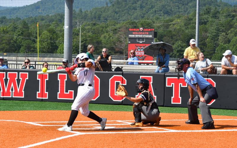 Wesley Branch/The Clayton Tribune.  Rabun County’s River Evans makes contact on a swing in a Rabun County win. Evans, the daughter of head coach Jessica Evans, is heading into her junior year after earning first team all-region honors a season ago.