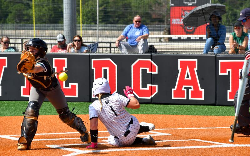 Wesley Branch/The Clayton Tribune. Rabun County’s Kenlee Hedge slides into home plate during Rabun County’s August 2025 win over Tallulah Falls. Hedge is one of three seniors on this year’s RCHS team.