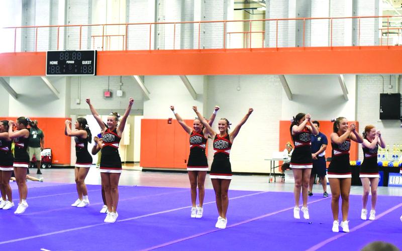 Submitted. The RCHS varsity cheer team goes through its routine.