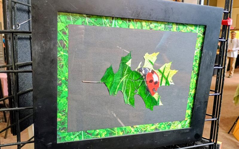 Megan Horn/The Clayton Tribune. A closeup view of one of North Georgia Arts Guild member Peggy Arnett’s paintings on a leaf. She featured her paintings during last weekend’s Painted Fern Art Festival.