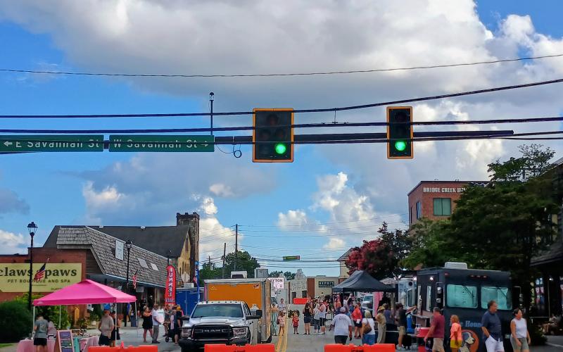 Megan Horn/The Clayton Tribune. Over 100 classic automobiles “cruised-in” to downtown Clayton on Saturday, Aug. 8, for the Block Party &amp; Cruise In. Hundreds of people attended the family-friendly event that featured classic automobiles, food trucks, music and local shopping and dining.