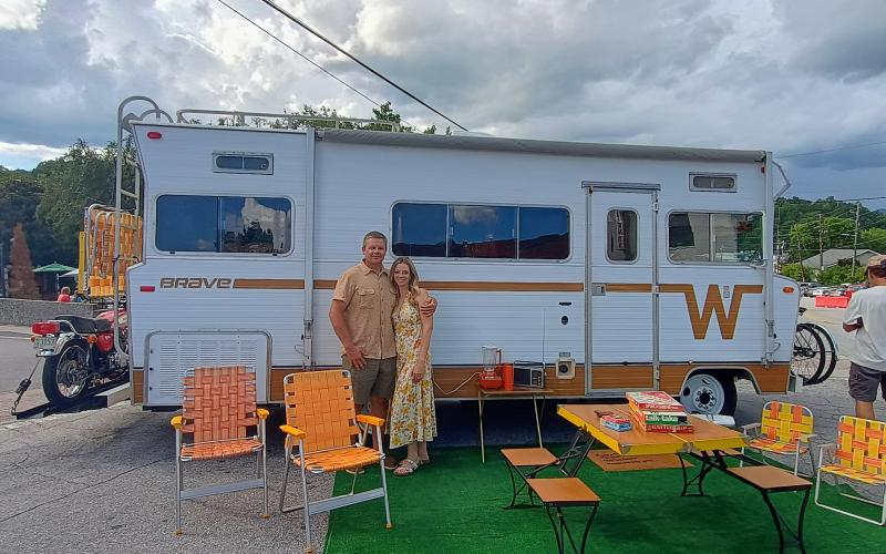 Megan Horn/The Clayton Tribune. Aaron and Angie Kolar cruised into the Aug. 8 Clayton Block Party &amp; Cruise-In event in  this 1973 Winnebago Brave that was hauling a motorcycle on the back.