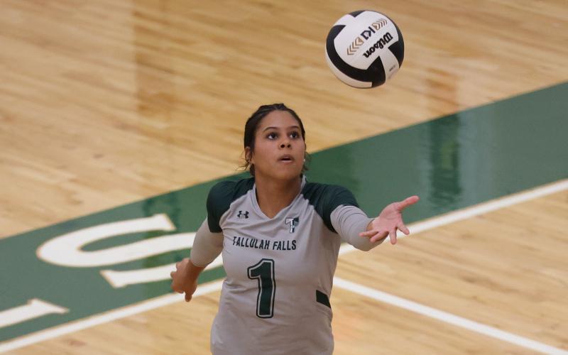 Submitted Photo. Tallulah Falls outside hitter Corrine Swinton from Toccoa, Ga., prepares to serve for the Lady Indians.