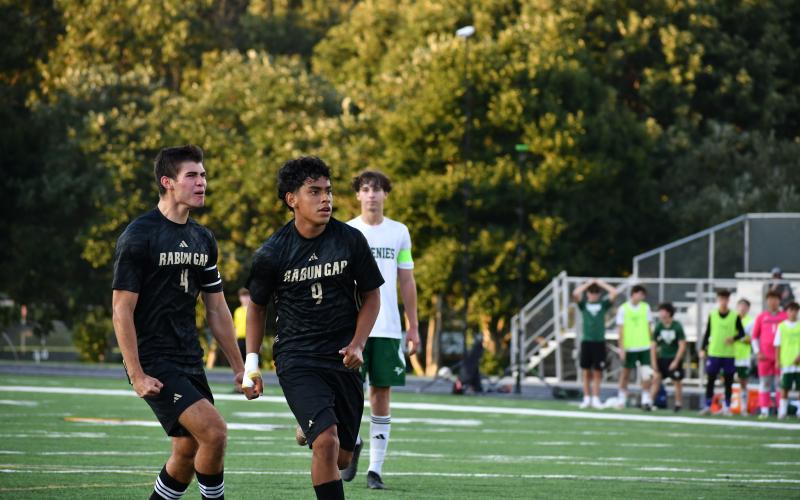 Photo by Wesley Branch/The Clayton Tribune. Rabun Gap’s Jose Luis Carrillo (center) celebrates after a goal on a penalty shot in Rabun Gap’s first game versus Christ School last season, which was canceled early and finished on Sept. 30, 2025.