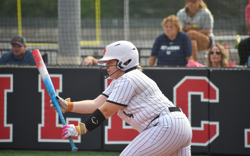 Wesley Branch/The Clayton Tribune. Rabun County senior Maddie Scott looks to lay down a bunt during a plate appearance in Rabun County’s 15-14 win over East Jackson on Aug. 3. Scott drew a walk with the bases loaded in the bottom of the seventh inning, bringing in the winning run.