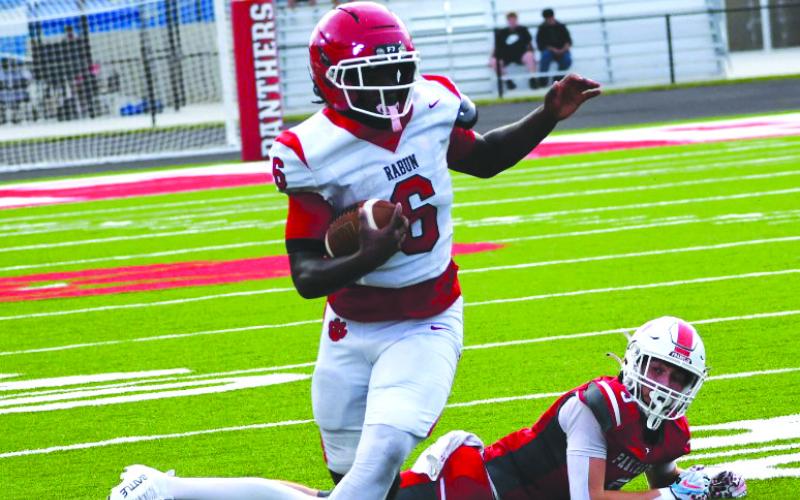 Enoch Autry/The Clayton Tribune. Wildcat senior running back JK Fruster racks up yardage in the second quarter of the Aug. 14 scrimmage.