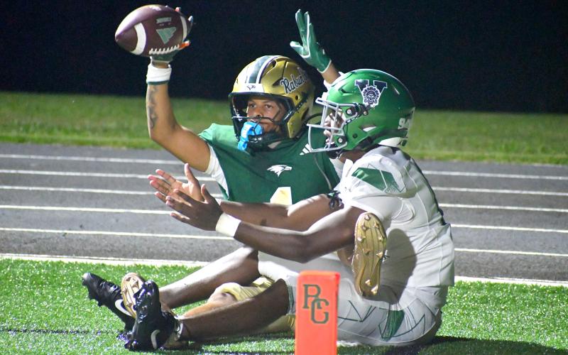 Wesley Branch/The Clayton Tribune. Rabun Gap wide receiver Alanson Simmons awaits the touchdown signal from the official after bringing in a 10-yard touchdown pass on the first play of Rabun Gap’s offensive possession in overtime. Simmons totaled 255 all-purpose yards and three touchdowns in the 42-40 overtime loss.