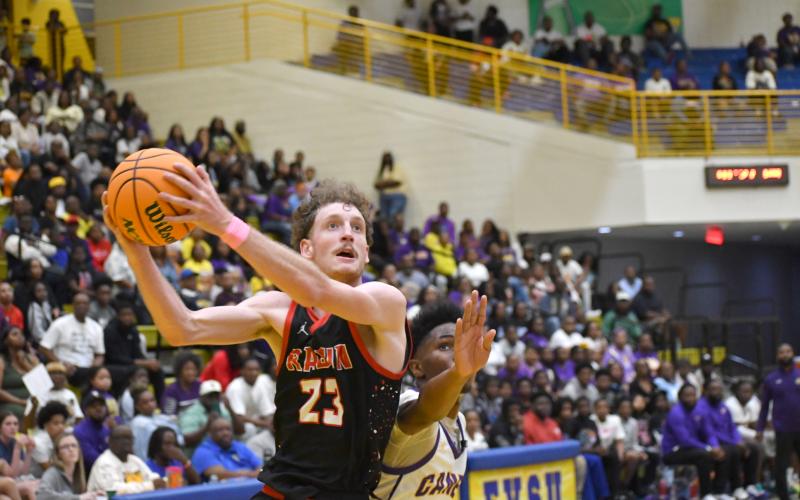 Wesley Branch/The Clayton Tribune. Rabun County 2026 graduate Hayes Free drives to the rim during Rabun County’s 71-59 win over Fitzgerald in the Class A Division I state semifinals on March 7. Free, a key member of the Wildcats’ state title winning team this year, committed to Young Harris College on July 28.