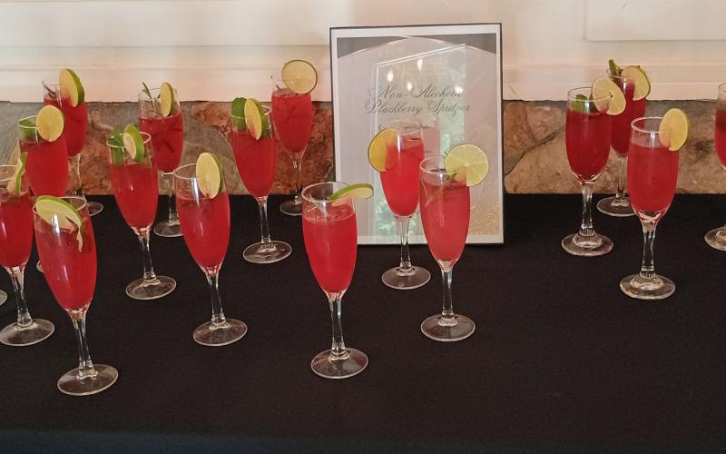 Megan Horn/The Clayton Tribune. Hors D’ouvres and beverages, including a non-alcoholic Blackberry Spritzer, were served to guests during the Aug. 1 Heartbeat Gala for Choices Pregnancy Center.