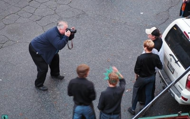 Photo courtesy Kevin Croom. Local photographer Kevin Croom captured Peter McIntosh taking pictures at the Christmas Parade on Main Street in Clayton in 2014.