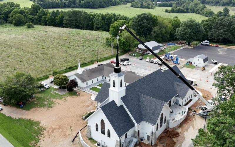 Photo courtesy Scott Poss. An aerial photo by Scott Poss shows the new sanctuary and the old one on Wolffork Valley Road in Rabun Gap.