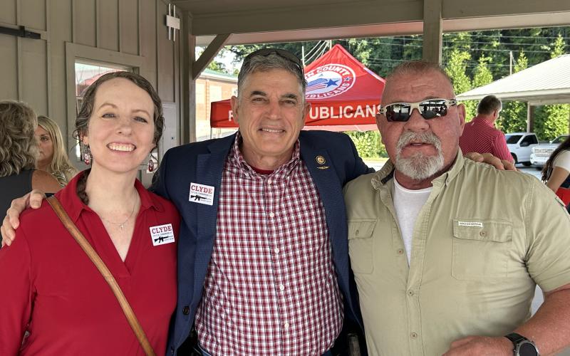 Photos courtesy Rabun County Republican Party.  Congressman Andrew Clyde and his wife, Jennifer, with Sheriff Mark Gerrells at the Rabun County Republican Party Red, White &amp; Blue Fundraiser. 