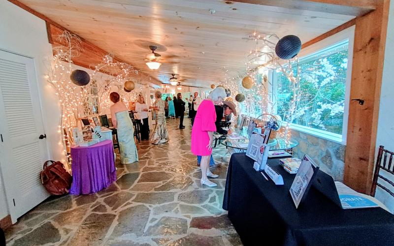 Megan Horn/The Clayton Tribune. There were many silent auction items to bid on during the Choices Heartbeat Gala on Saturday, Aug. 1.