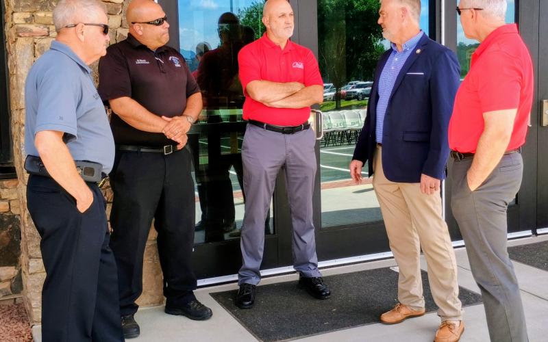 Megan Horn/The Clayton Tribune. Many community members attended the ribbon cutting of the new Rabun County High School Academic Building. Pictured are Rabun County EMS/911 Director Mike Carnes, left; Rabun County EMA Director Brian Panell; City of Clayton Mayor Roy Quilliams; District 10 State Rep. Victor Anderson; and Rabun County Board of Education Member and President of Forward Rabun/Rabun County Chamber of Commerce Rick Story.