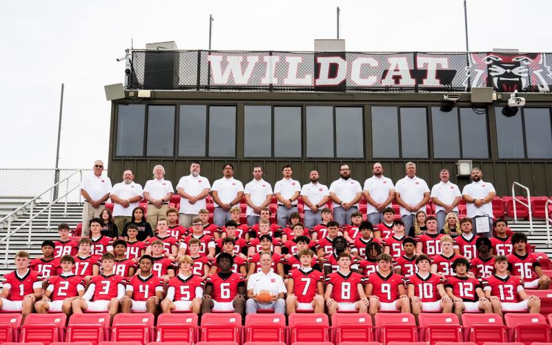 Submitted photo. The 2026 version of the Wildcats football team will begin its regular season on Aug. 28 at home when Rabun County welcomes Metter with former RCHS head coach Lee Shaw to Frank Snyder Memorial Stadium. This will be Rance Gillespie’s second year as the Wildcats’ head coach after returning to his alma mater in 2025. This team photograph includes players, coaches and support staff. Bottom Row (from left): Reed Burrell, Reed LaFevers, Cooper Kowalsky, Akai Agyipon, Wyatt English, JK Fruster, Hea