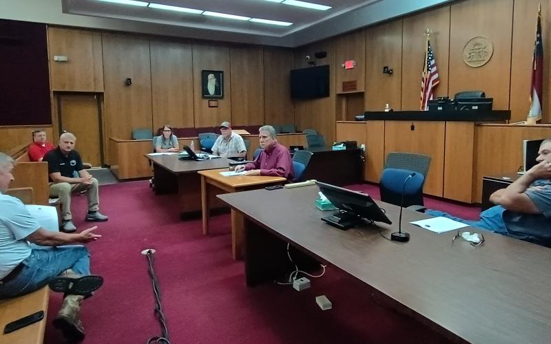 Megan Horn/The Clayton Tribune. Rabun County Attorney Allyn Stockton, left, speaks to Rabun County commissioners and officials during a special called meeting Aug. 21 about a letter received from Rabun County Water and Sewer (RCWSA) members about the City of Demorest's condemnation of Tallulah Falls property for a proposed Water Treatment Plant.