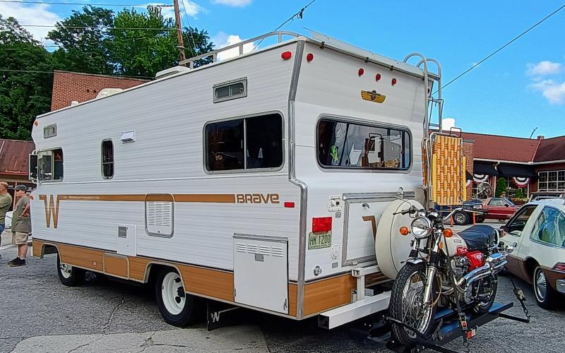 Megan Horn/The Clayton Tribune. Aaron and Angie Kolar cruised into the Aug. 8 Clayton Block Party &amp; Cruise-In event in  this 1973 Winnebago Brave that was hauling a motorcycle on the back.