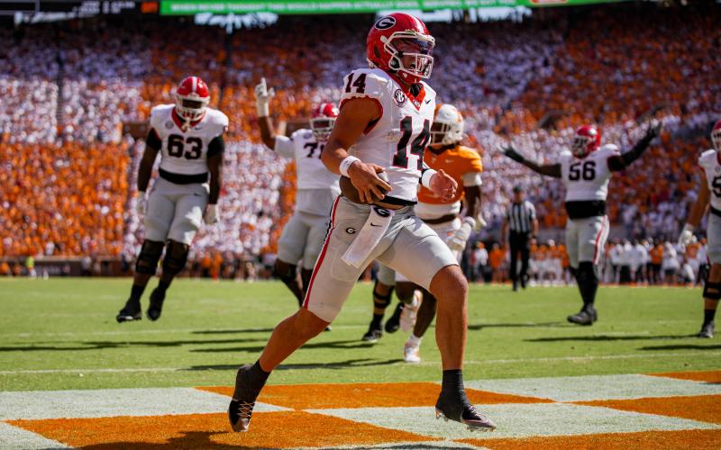 Photo courtesy UGAAA. Rabun County standout and current Georgia quarterback Gunner Stockton sprints into the end zone in Knoxville against Tennessee in a back-and-forth 44-41 overtime game on Sept. 13, 2025.