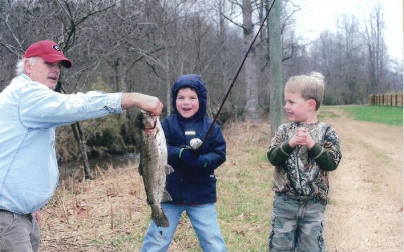 Photo courtesy Stockton family.  Former Rabun County assistant coach George Bobo along with Gunner Stockton and Drew Bobo in Rabun County when the now Georgia football players were growing up.