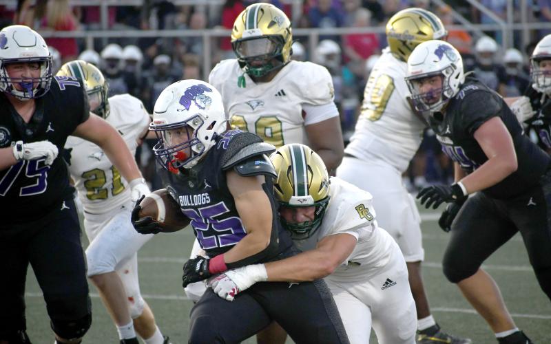 Wesley Branch/The Clayton Tribune. Rabun Gap linebacker Jay Schell brings down Brownsburg’s Brady Lewis during Rabun Gap’s 31-15 loss versus Brownsburg on Aug. 28. The Eagles will host No. 6 Baylor this Friday, Sept. 4.