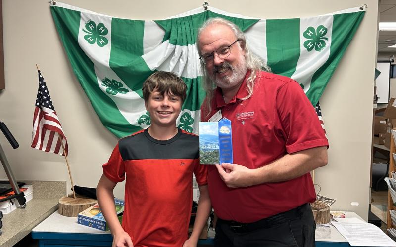 Photo courtesy of Rabun County 4-H. Pictured are First Place winner Mason Beck, left, and Rabun County 4-H Educator Joey Eller.