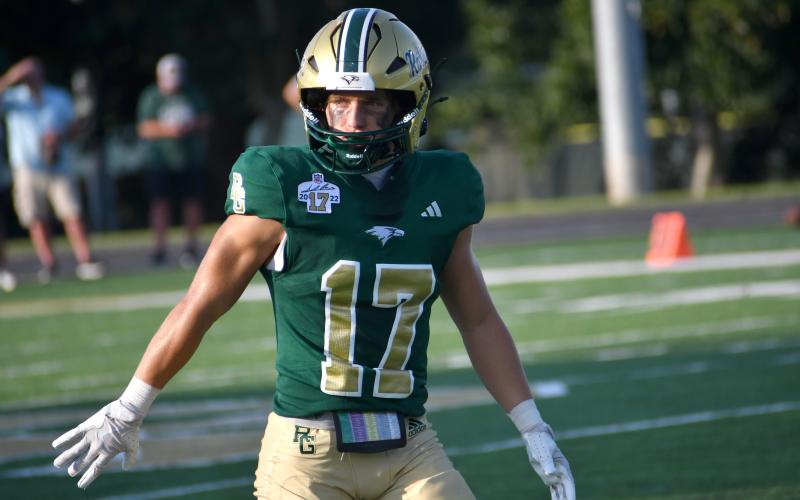 Wesley Branch/The Clayton Tribune. Rabun Gap wide receiver Hector Nahle lines up before a play versus Venice on Aug. 21. Nahle, a cancer survivor, transferred to RGNS in 2024 to continue to pursue his football dreams.