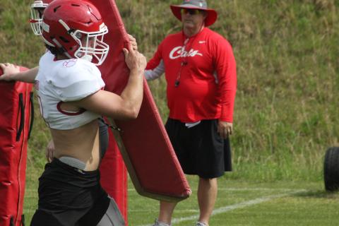 Rabun County linebacker AJ Wheeler participates in a tackling drill during a practice in May. (Glendon Poe/The Clayton Tribune)