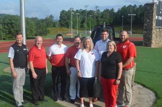 Wayne Knuckles/The Clayton Tribune. Allen Blair, back left, assistant principal of Rabun County High School (RCHS), Dr. Jay Fowler, principal of Rabun County Primary School (RCPS), Jonathan Gibson, assistant superintendent, Marty Dixon, transportation director, Justin Spillers, principal of RCHS, and John Franco, assistant principal of Rabun County High School. (front) Dr. April Childers, superintendent, and Kelly McKay, assistant superintendent.